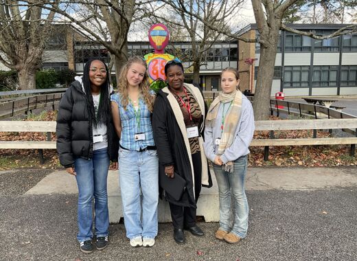 2025 11 13 Lissette posing with some of Cheney School?s Sixth Form students