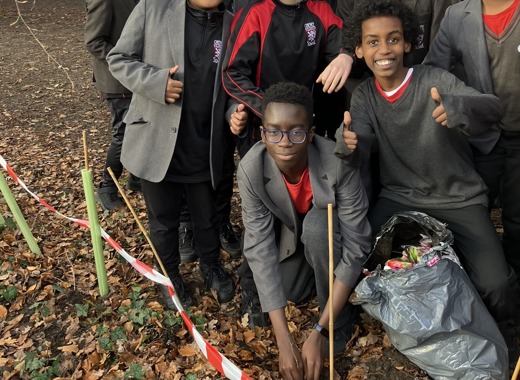 Ubong and Nadeem Yr7 Plant Trees 25Nov2025 IMG 0932 (1)